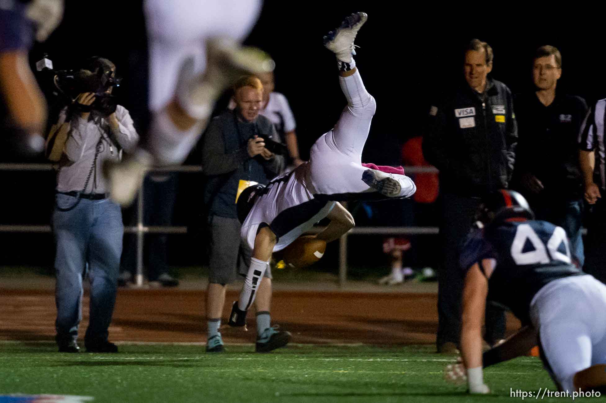 Trent Nelson  |  The Salt Lake Tribune
Corner Canyon quarterback Michael Ebeling dives into the end zone for a two-point conversion and the win over Woods Cross High School football, in Woods Cross, Wednesday October 15, 2014.