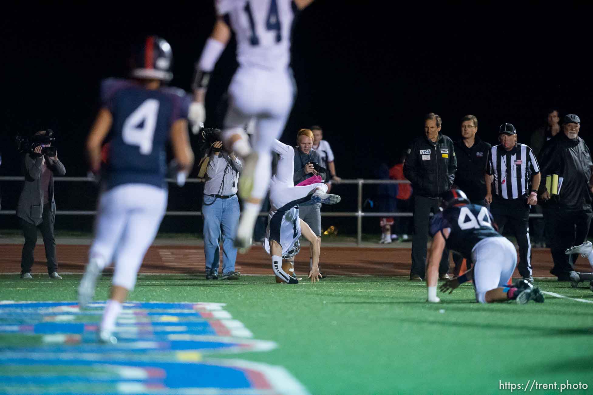 Trent Nelson  |  The Salt Lake Tribune
Corner Canyon quarterback Michael Ebeling dives into the end zone for a two-point conversion and the win over Woods Cross High School football, in Woods Cross, Wednesday October 15, 2014.