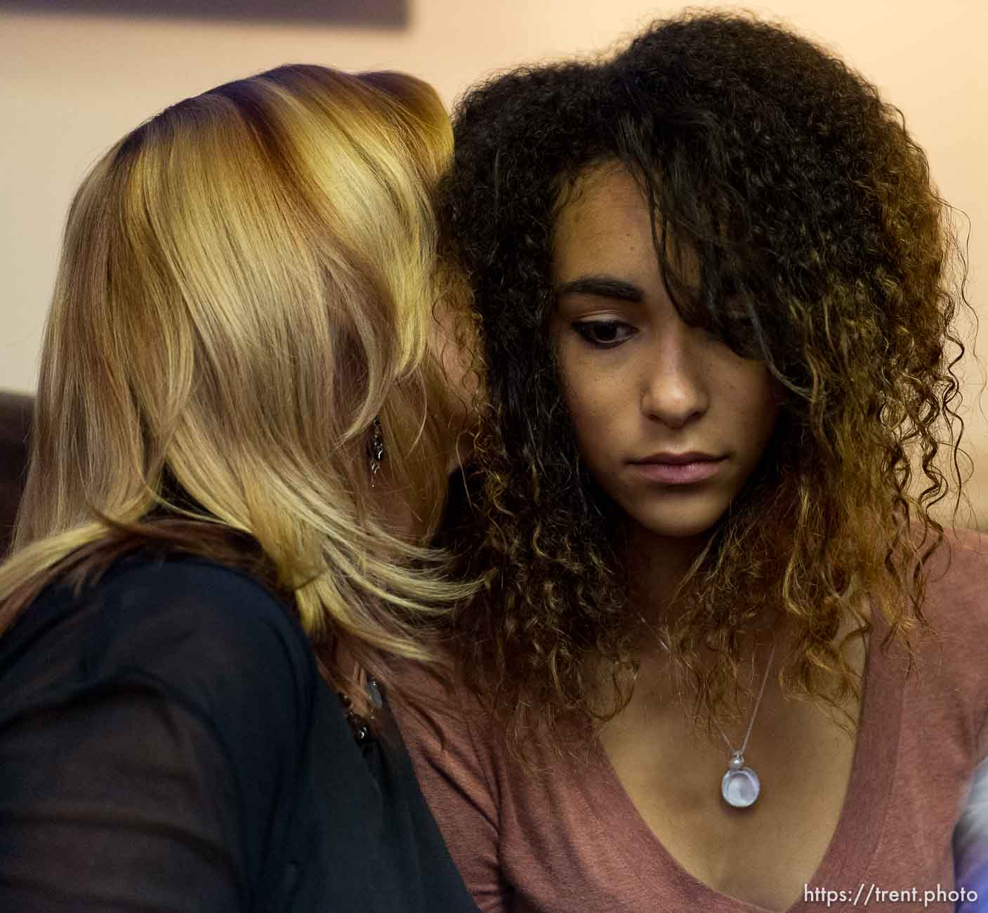 Trent Nelson  |  The Salt Lake Tribune
Cindy Moss comforts her neice, Aliya Hunt, sister of Darrien Hunt, during at a press conference in Salt Lake City, Friday October 17, 2014. An autopsy report released Friday says Darrien Hunt was shot several times in the back by Saratoga Springs police officers chasing him.