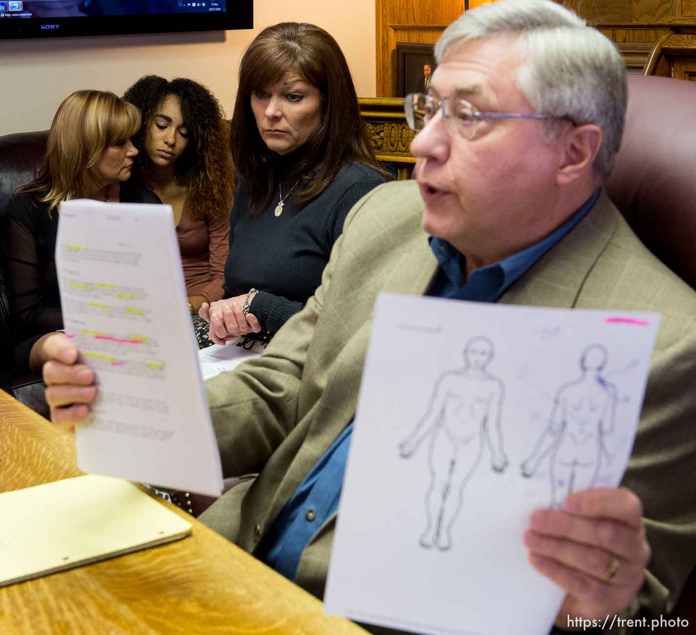 Trent Nelson  |  The Salt Lake Tribune
Attorney Robert Sykes, right, and Darrien Hunt's mother Susan Hunt, center, speak at a press conference in Salt Lake City, Friday October 17, 2014. An autopsy report released Friday says Darrien Hunt was shot several times in the back by Saratoga Springs police officers chasing him. At rear is Cindy Moss (Darrien's aunt) and Aliya Hunt (Darrien's sister).