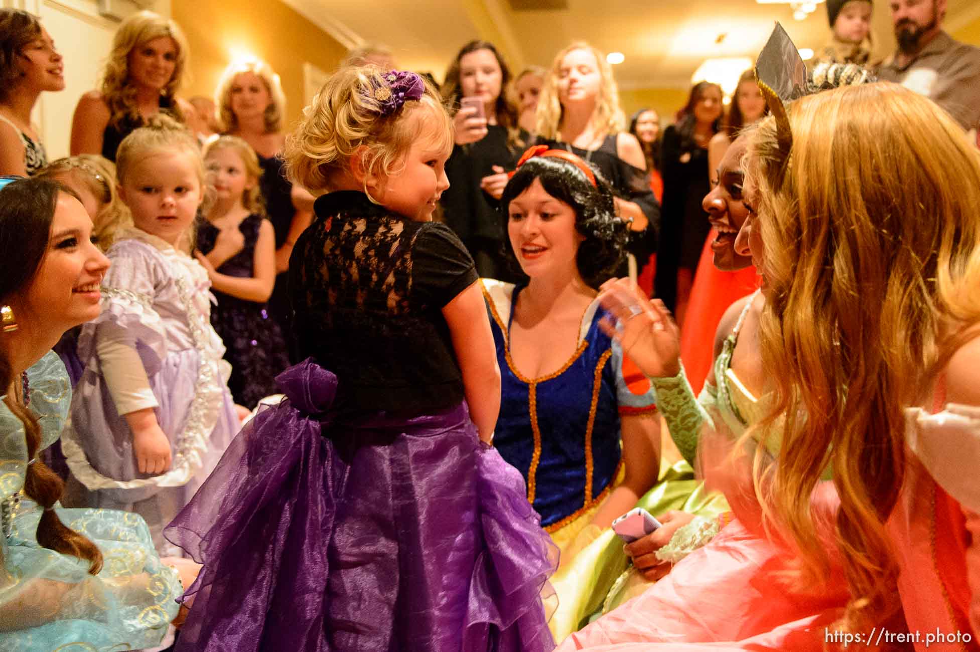 Trent Nelson  |  The Salt Lake Tribune
Raenalynn Brock, a 4-year-old diagnosed with cancer, meets a group of princesses at her prom. Brock had always wanted to go to prom, so one was put on for her at the Hotel Monaco in Salt Lake City, Saturday November 15, 2014.