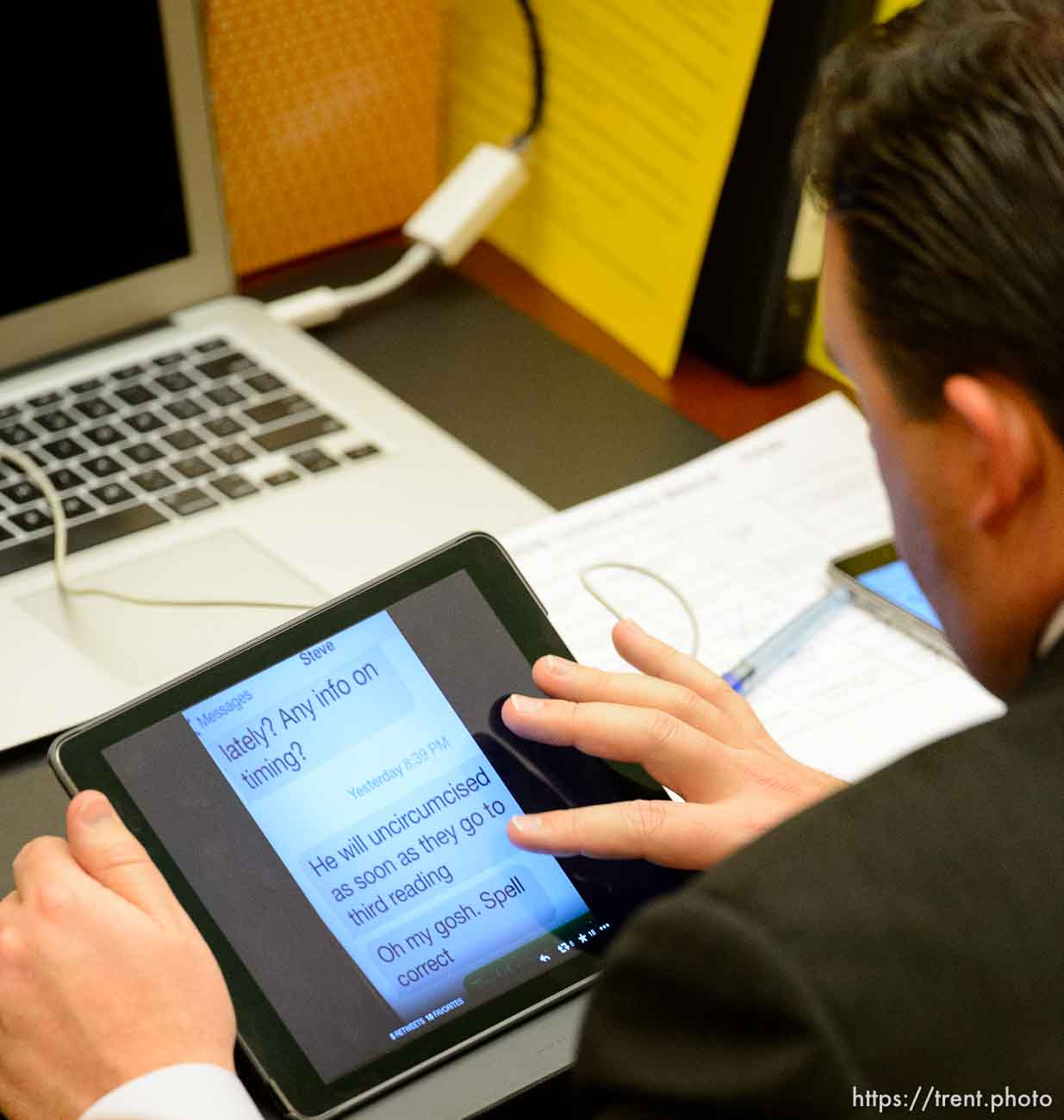 Rep. Robert Spendlove, checking twitter, in the House Chamber at the State Capitol Building in Salt Lake City, Wednesday March 11, 2015.