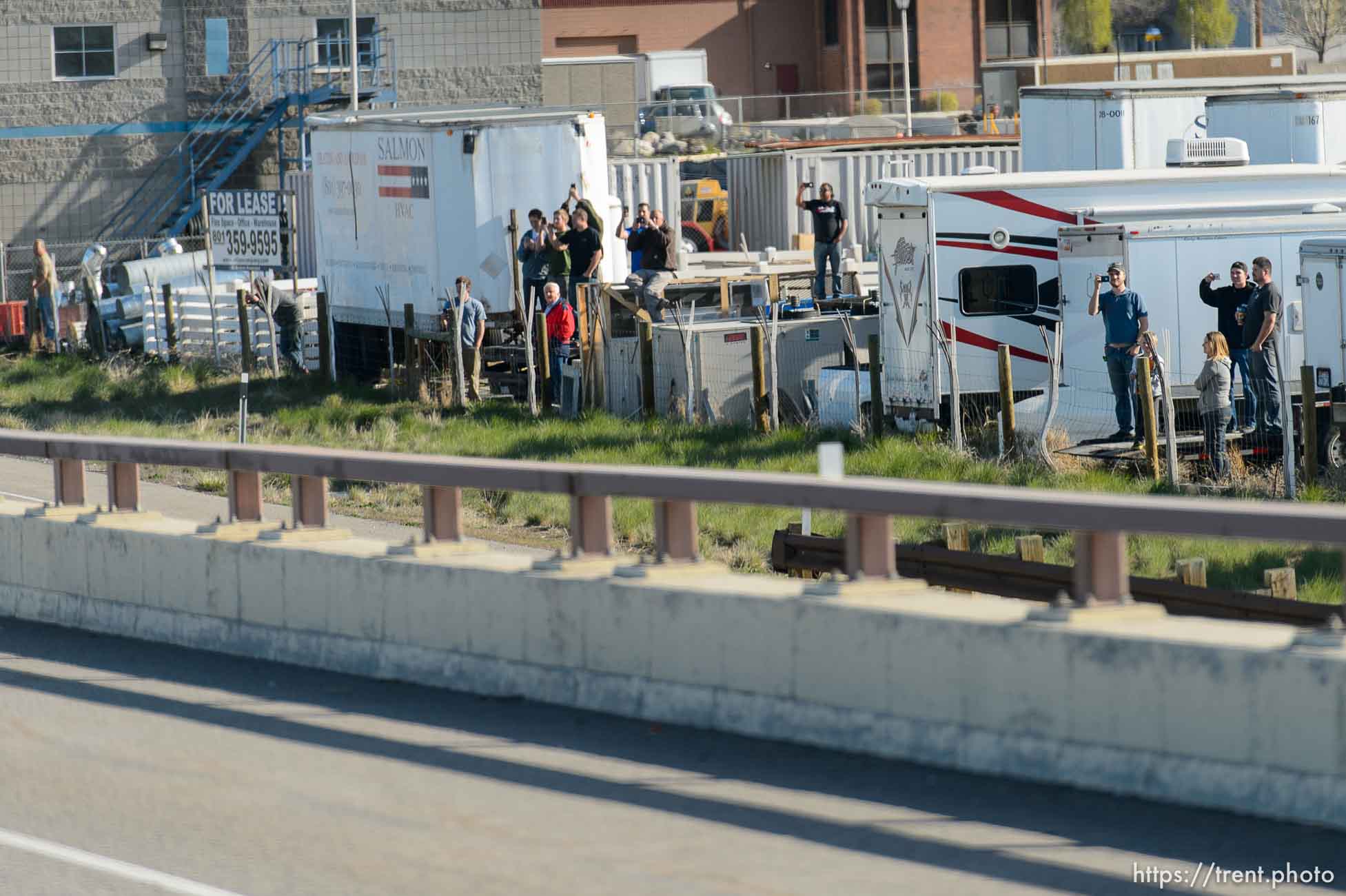 Trent Nelson  |  The Salt Lake Tribune
Onlookers line the route of President Barack Obama's motorcade as it makes its way from Salt Lake City to Hill Air Force Base, Friday April 3, 2015.