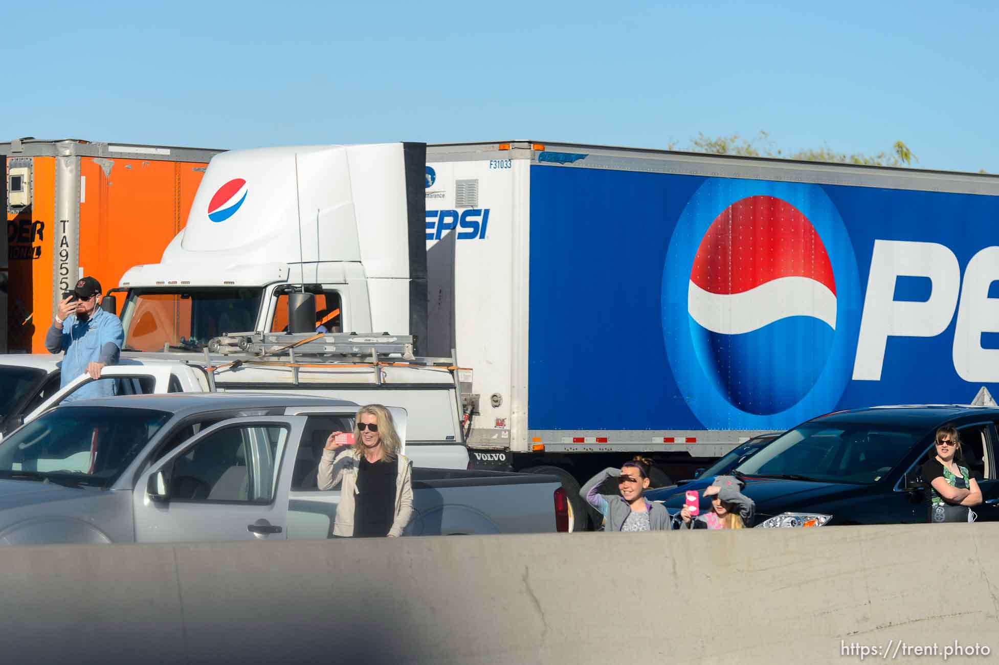 Trent Nelson  |  The Salt Lake Tribune
Onlookers line the route of President Barack Obama's motorcade as it makes its way from Salt Lake City to Hill Air Force Base, Friday April 3, 2015.