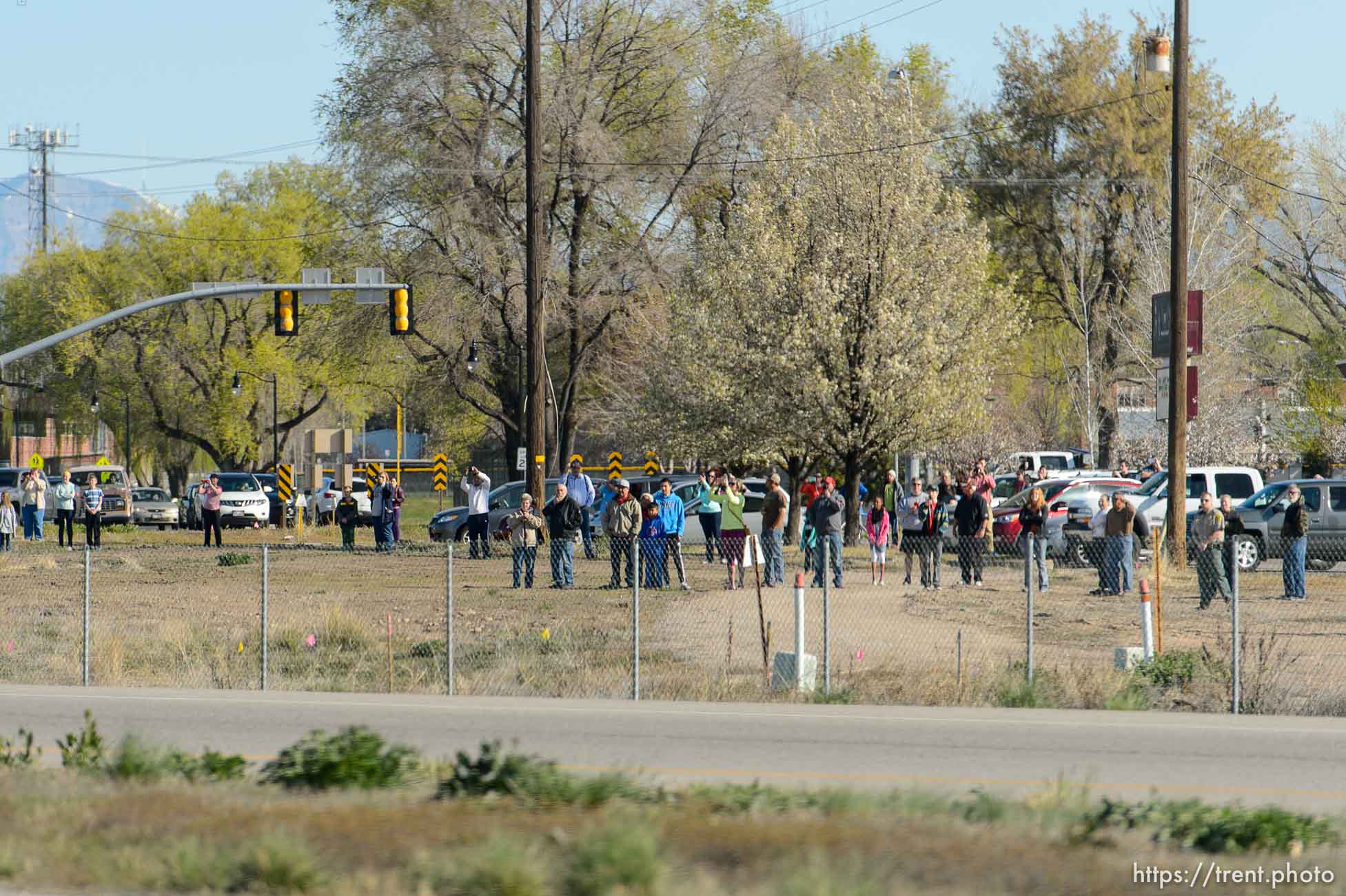 Trent Nelson  |  The Salt Lake Tribune
Onlookers line the route of President Barack Obama's motorcade as it makes its way from Salt Lake City to Hill Air Force Base, Friday April 3, 2015.