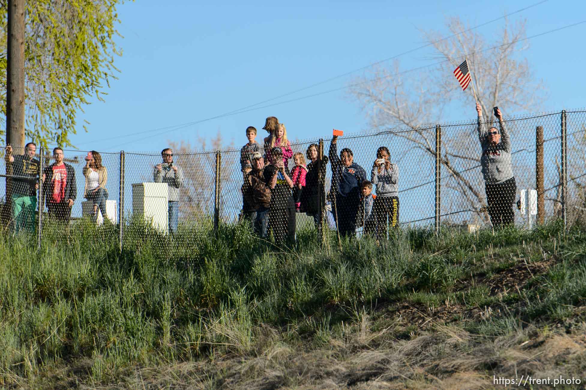 Trent Nelson  |  The Salt Lake Tribune
Onlookers line the route of President Barack Obama's motorcade as it makes its way from Salt Lake City to Hill Air Force Base, Friday April 3, 2015.