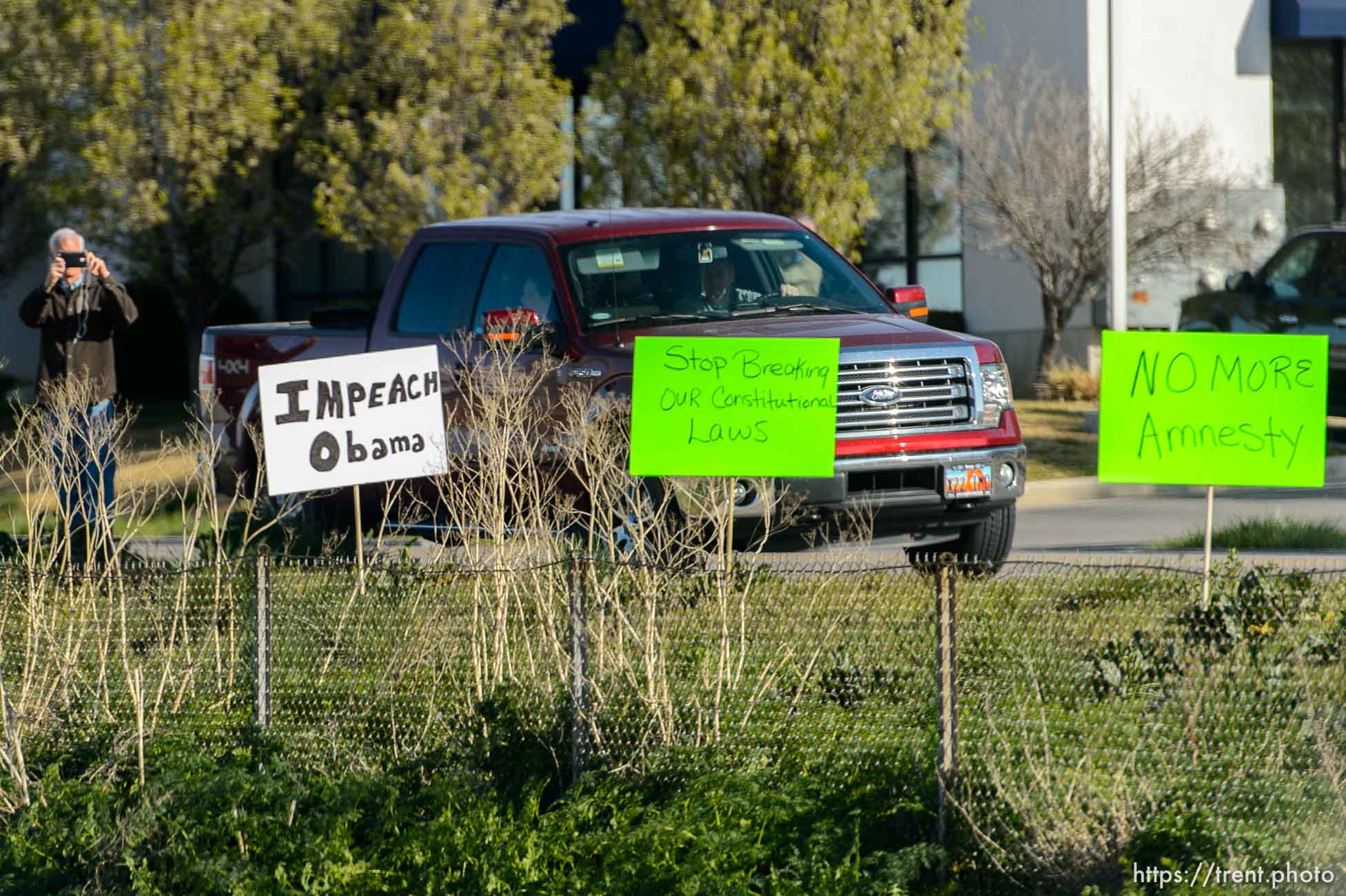 Trent Nelson  |  The Salt Lake Tribune
Onlookers line the route of President Barack Obama's motorcade as it makes its way from Salt Lake City to Hill Air Force Base, Friday April 3, 2015.