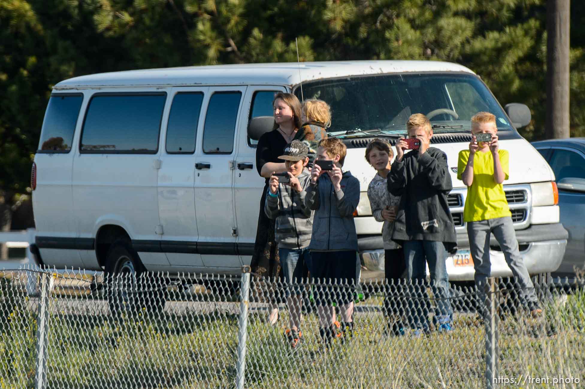 Trent Nelson  |  The Salt Lake Tribune
Onlookers line the route of President Barack Obama's motorcade as it makes its way from Salt Lake City to Hill Air Force Base, Friday April 3, 2015.