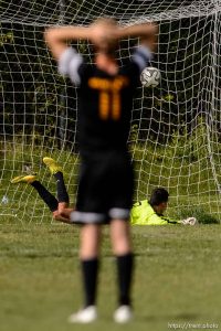 Trent Nelson  |  The Salt Lake Tribune
Skyline's Dallin Holding (12) scores on a penalty kick during a first round Class 4A soccer state game between Wasatch and Skyline High School, in Salt Lake City, Wednesday May 13, 2015.