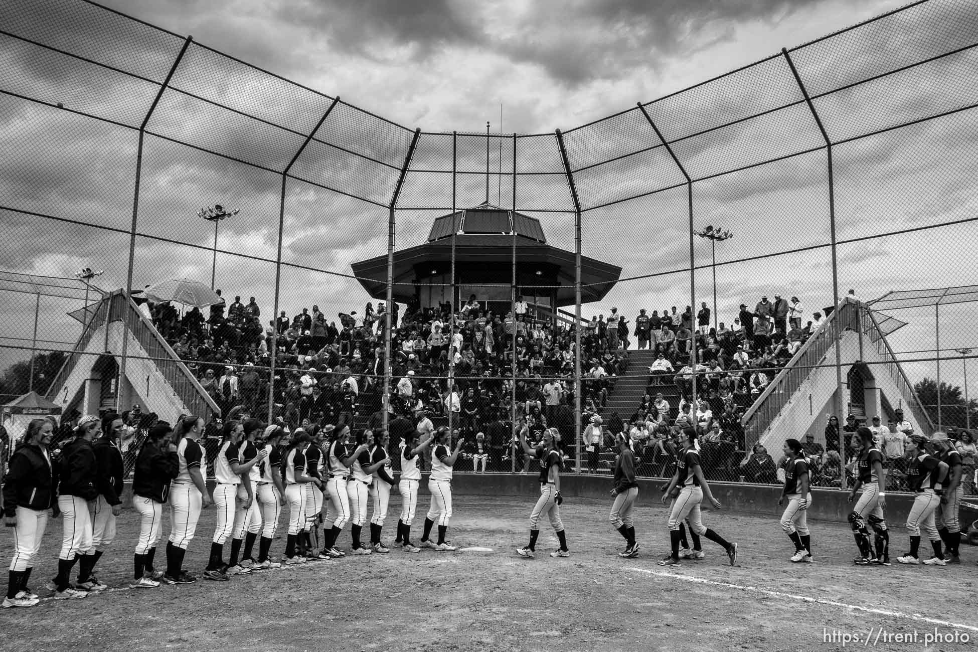 Trent Nelson  |  The Salt Lake Tribune
The Herriman and Copper Hills High School softball teams meet at home plate following Herriman's win, in West Valley City, Thursday May 21, 2015.