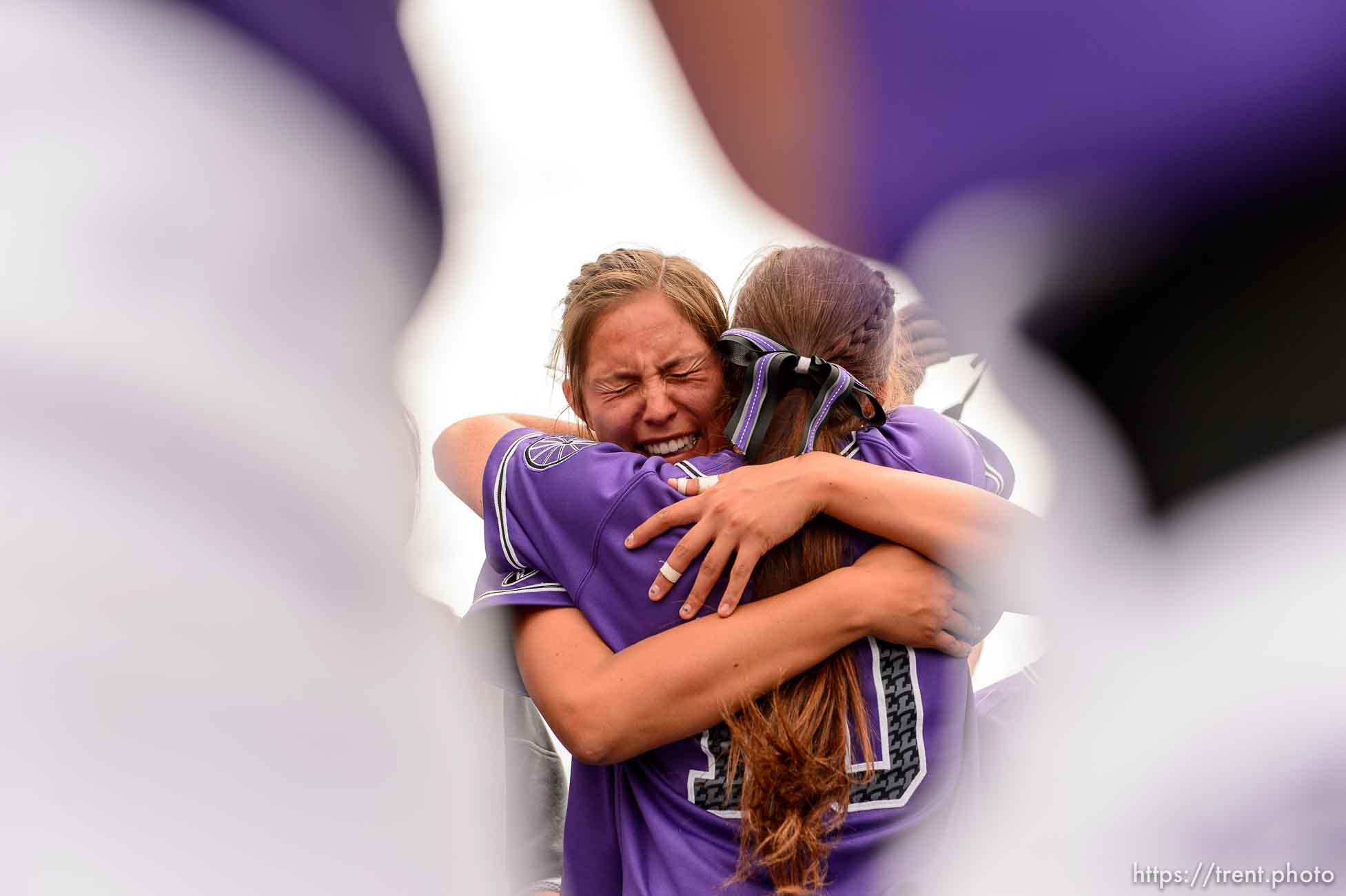 Trent Nelson  |  The Salt Lake Tribune
Lehi's Terra Tahbo embraces a teammate after beating Herriman in the 5A high school softball championship game, in West Valley City, Friday May 22, 2015.