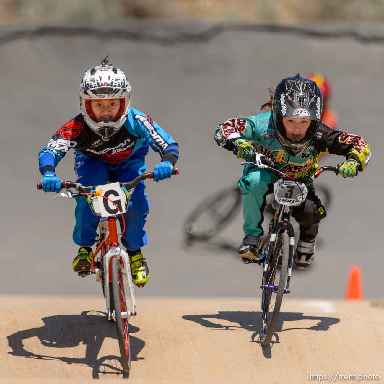 Trent Nelson  |  The Salt Lake Tribune
9-year-old girls Gianna Davila, left, and Stella Sunseri race at the U.S. BMX National Series at Rad Canyon BMX in South Jordan, Saturday June 13, 2015.