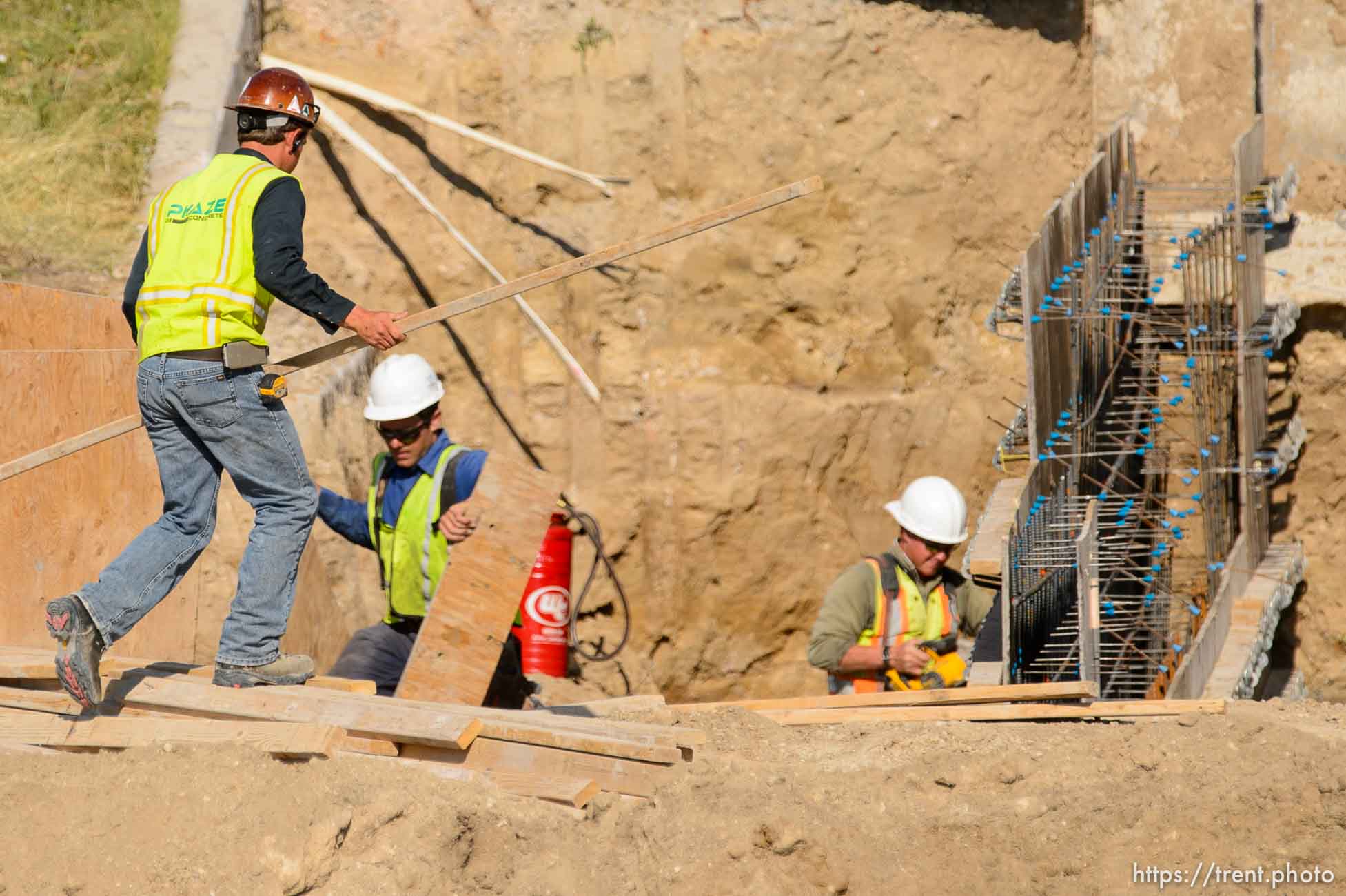 Trent Nelson  |  The Salt Lake Tribune
Workers from Phaze Concrete on the construction site of the new Rawlins High School in Rawlins, Wyoming, Tuesday June 30, 2015.