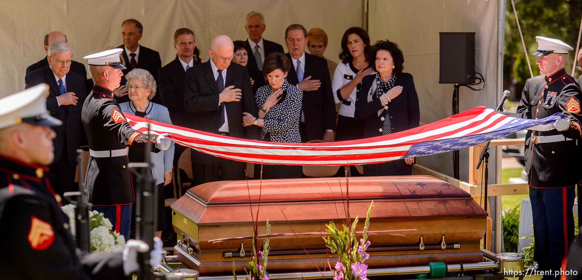 Trent Nelson  |  The Salt Lake Tribune
LDS Church leaders stand as a Marine Corps Honor Guard performs a flag ceremony at the graveside service for the late LDS apostle L. Tom Perry,  Friday June 5, 2015 at the Salt Lake City Cemetery.