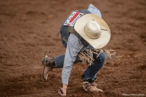 Trent Nelson  |  The Salt Lake Tribune
Nathan Urie gets up after competing in Saddle Bronc at the Utah High School Rodeo Association state championships in Heber, Saturday June 6, 2015.