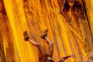 Trent Nelson  |  The Salt Lake Tribune
Runners slip down a slide at the Dirty Dash, held at Soldier Hollow, Saturday June 6, 2015.