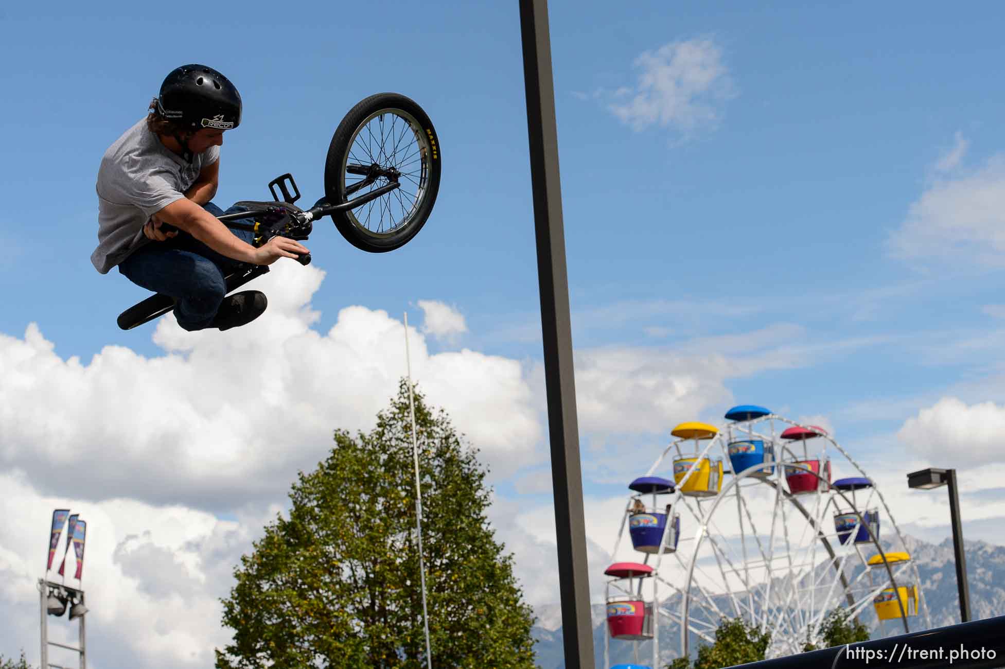 Trent Nelson  |  The Salt Lake Tribune
Braxton Baty performs during a show put on by 5050BMX at the Salt Lake County Fair in South Jordan, Wednesday August 12, 2015. The fair opened Wednesday, celebrating its 79th year with events, rides, exhibitions and activities designed to be “fun for the whole herd.”