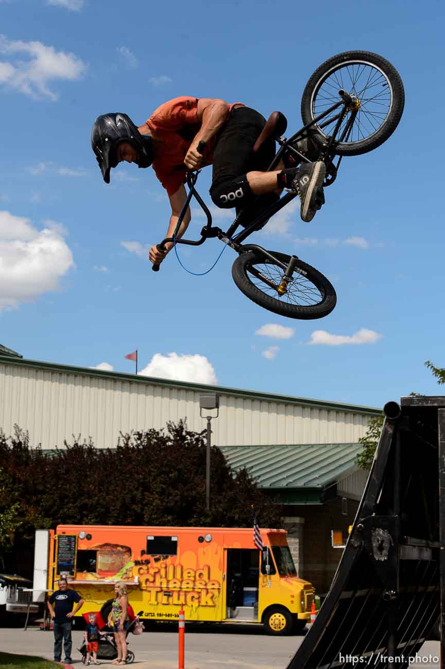 Trent Nelson  |  The Salt Lake Tribune
Garrett Holm performs during a show put on by 5050BMX at the Salt Lake County Fair in South Jordan, Wednesday August 12, 2015. The fair opened Wednesday, celebrating its 79th year with events, rides, exhibitions and activities designed to be “fun for the whole herd.”