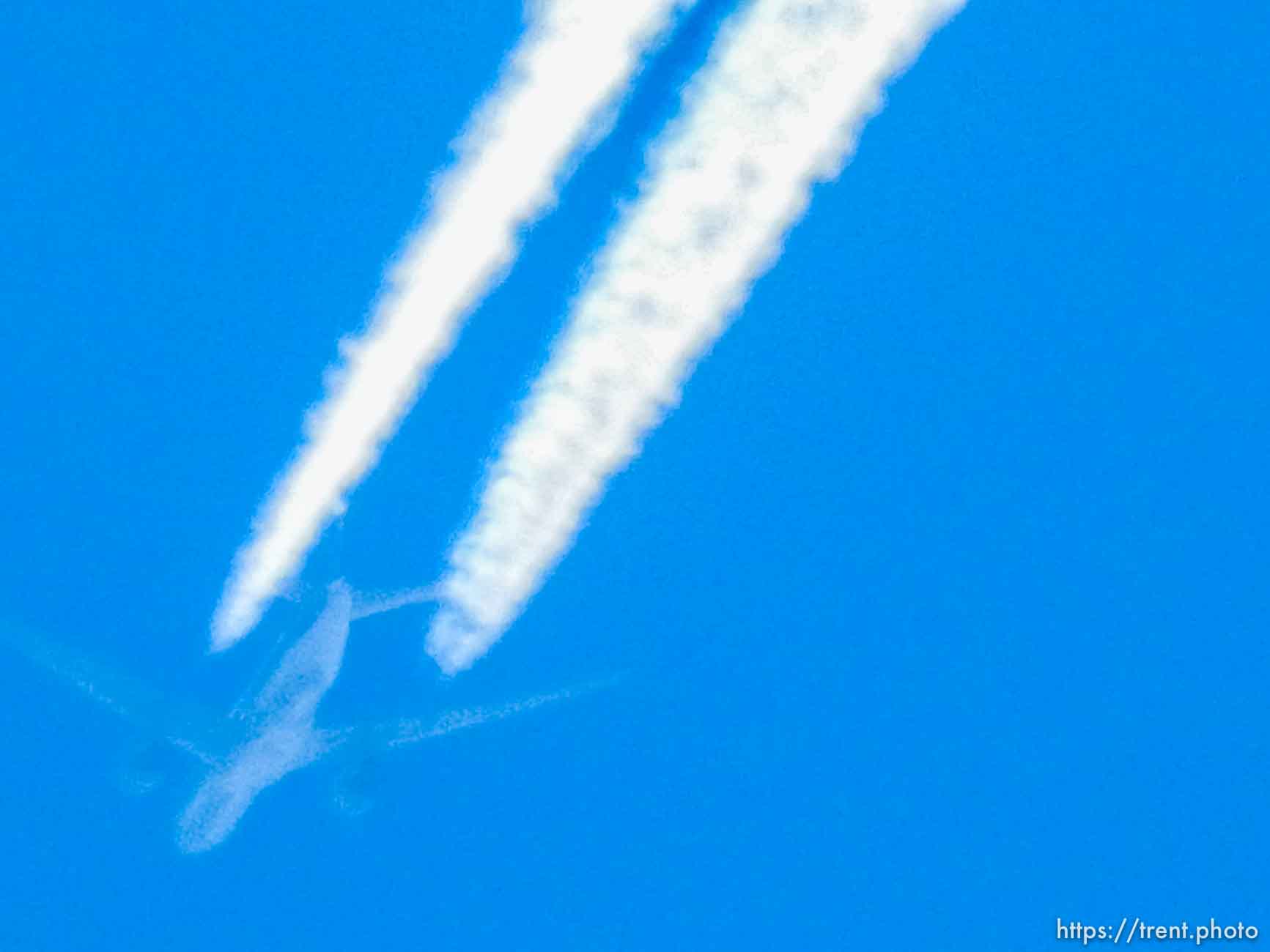 passenger jet overhead, in Salt Lake City, Friday August 28, 2015.