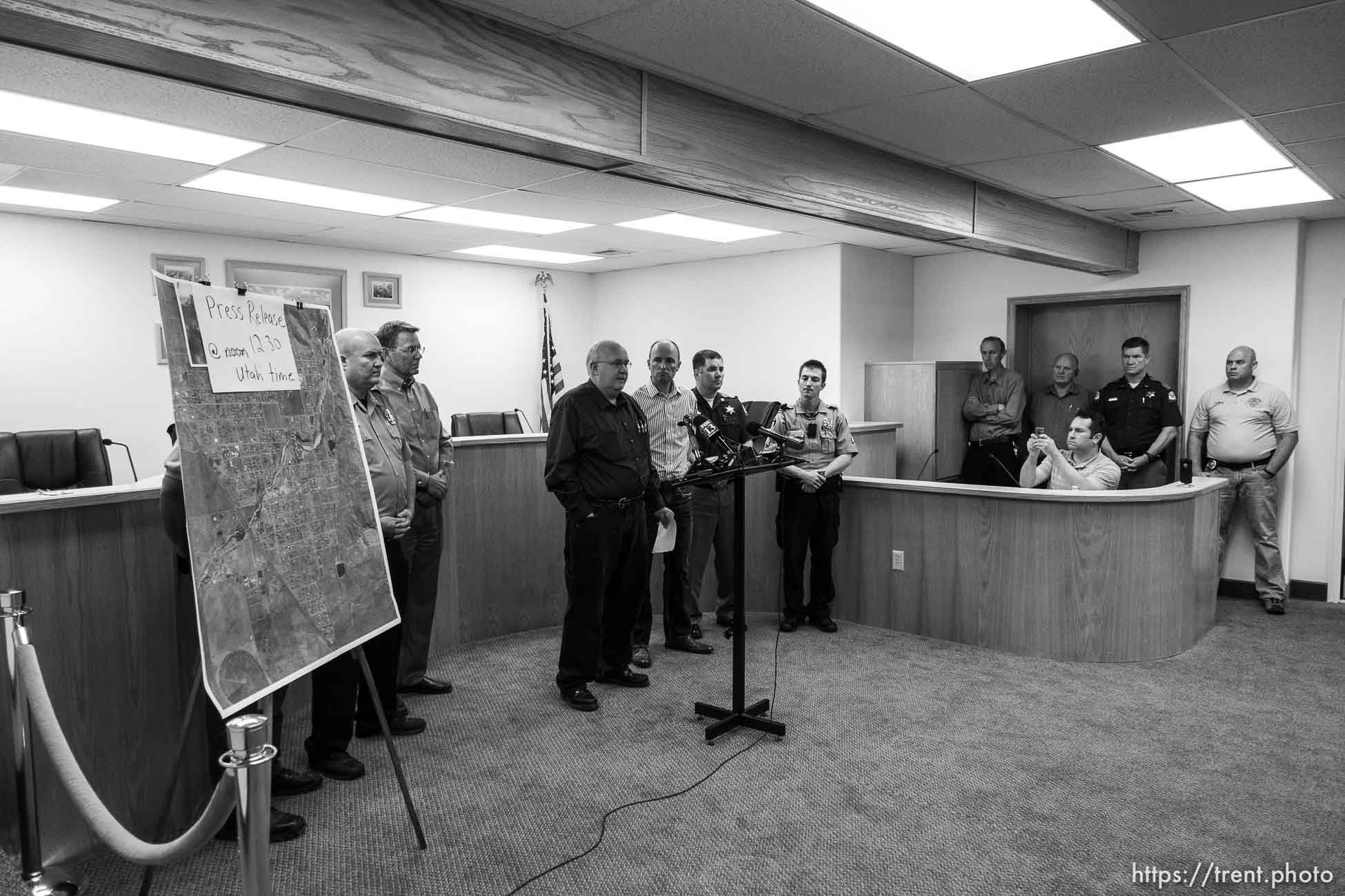 Trent Nelson  |  The Salt Lake Tribune
Hildale Mayor Philip Barlow, Lt. Governor Spencer Cox, flash flood press conference at colorado city hall,  Tuesday September 15, 2015.
Eight people had died and five remained missing Tuesday morning, the day after an SUV and a van were washed off a road during a flash flood in this polygamous Utah-Arizona border community