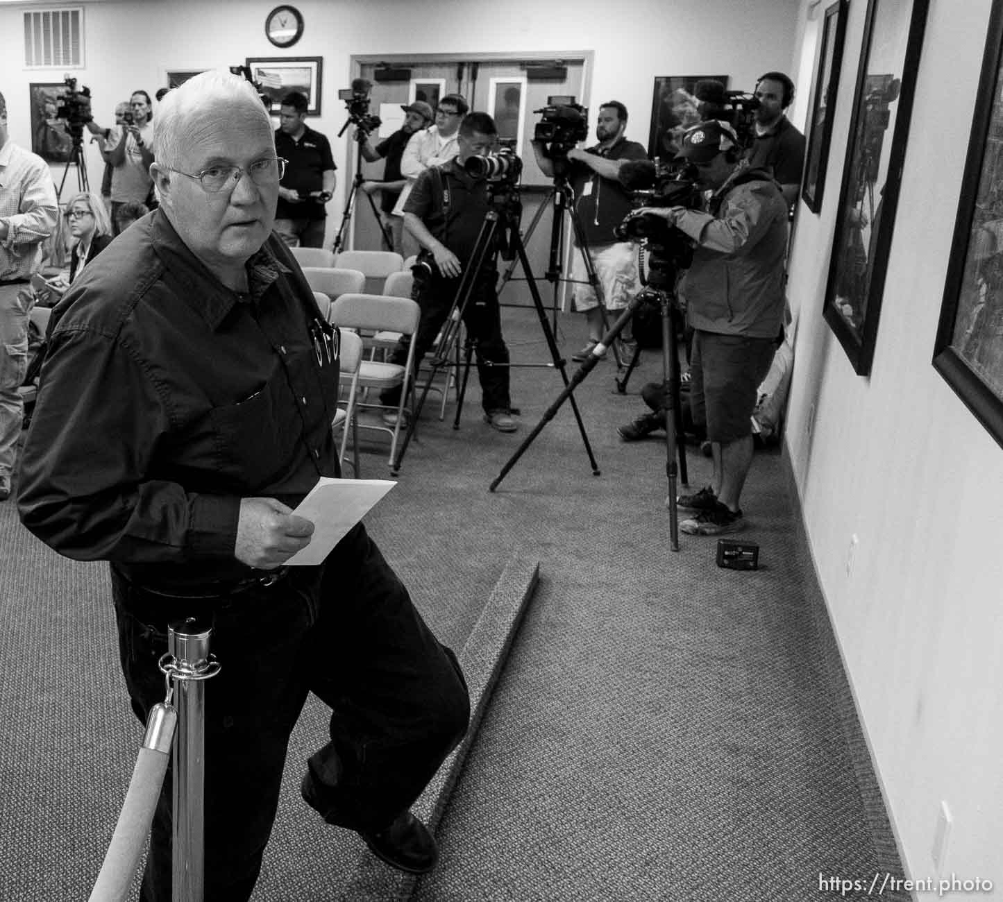 Trent Nelson  |  The Salt Lake Tribune
Hildale Mayor Philip Barlow leaves a press conference after nine people were killed and five remained missing Tuesday morning, the day after an SUV and a van were washed off a road during a flash flood in this polygamous Utah-Arizona border community.