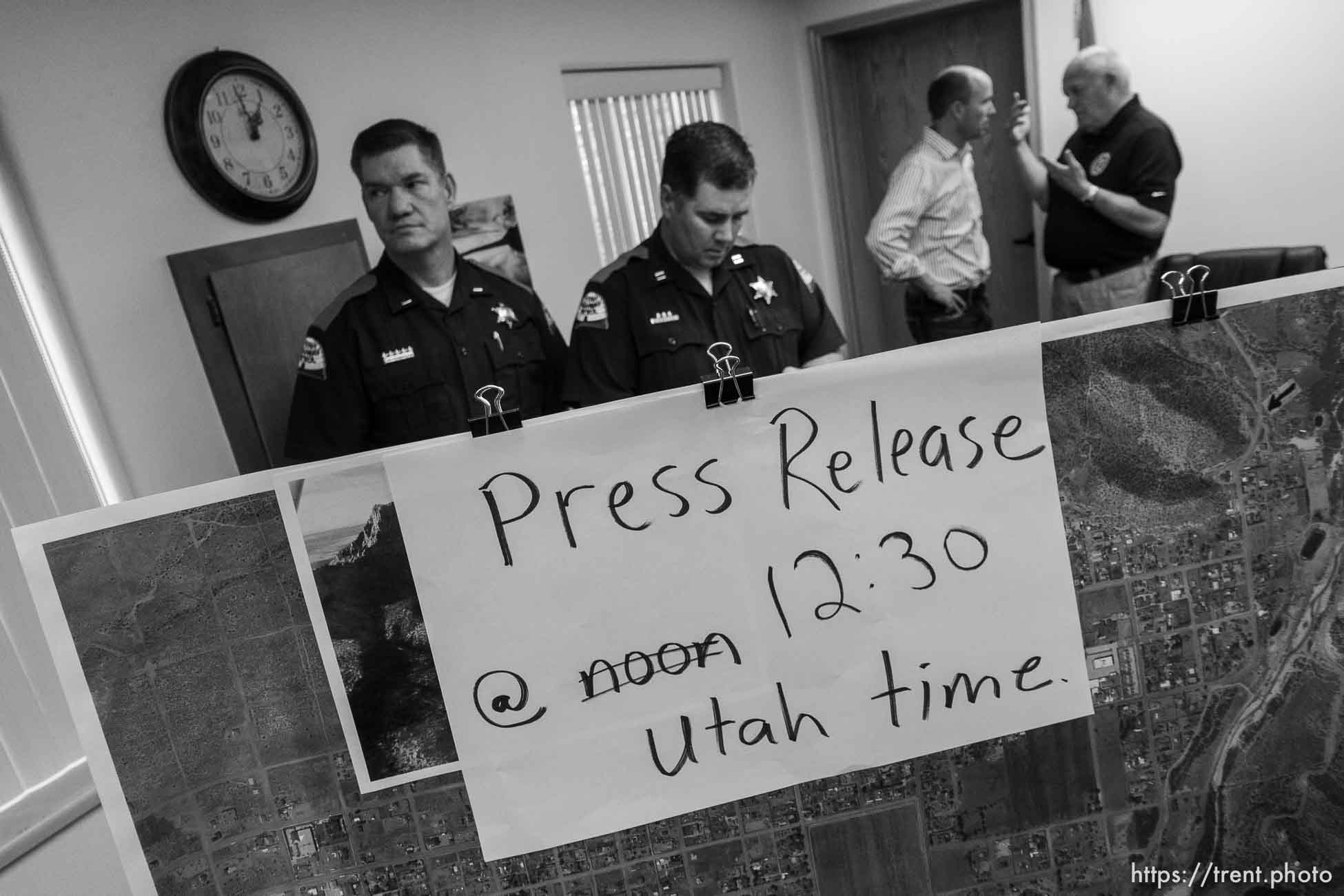 Trent Nelson  |  The Salt Lake Tribune
Lt. Governor Spencer Cox in white, flash flood press conference at colorado city hall,  Tuesday September 15, 2015.
Eight people had died and five remained missing Tuesday morning, the day after an SUV and a van were washed off a road during a flash flood in this polygamous Utah-Arizona border community