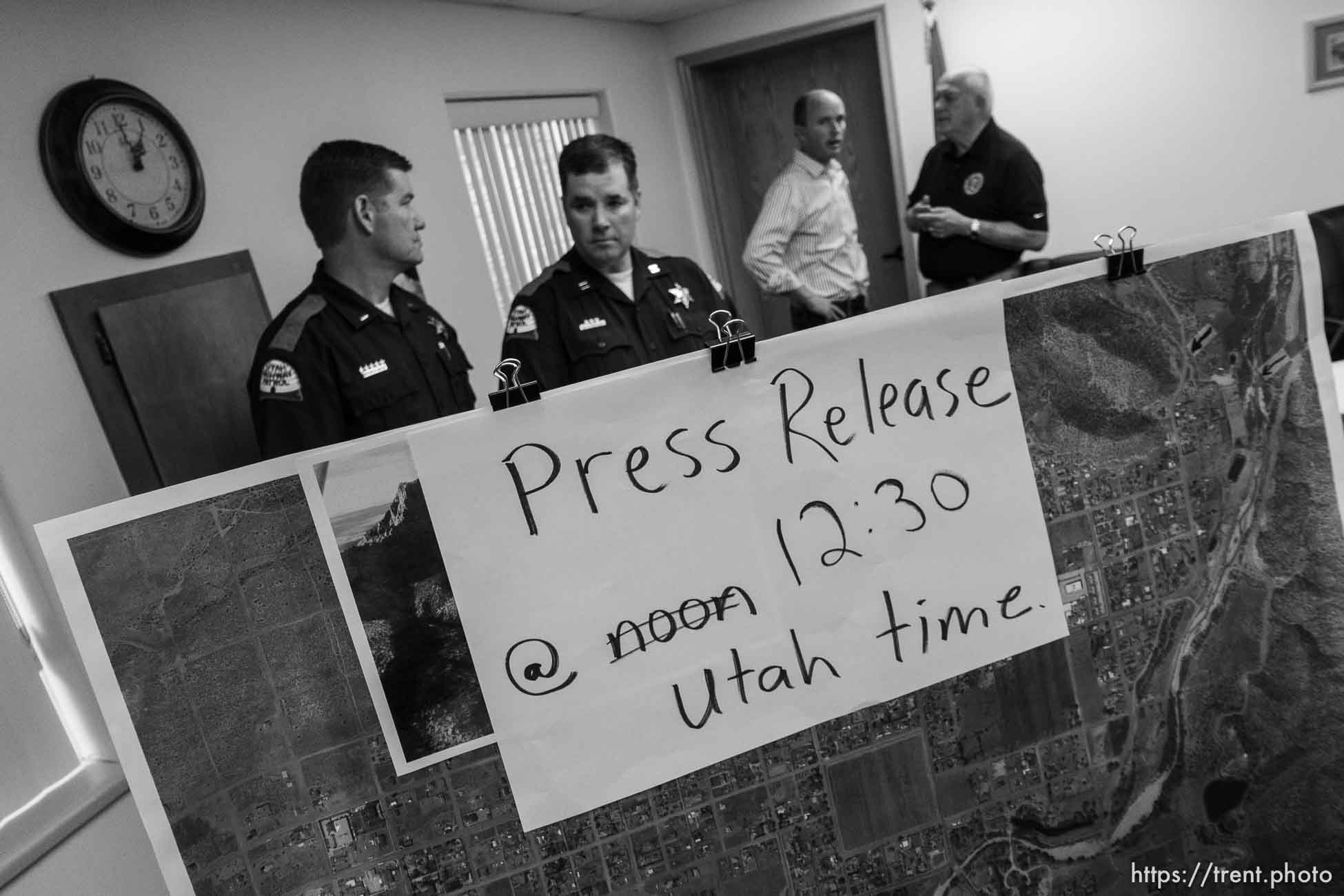 Trent Nelson  |  The Salt Lake Tribune
Lt. Governor Spencer Cox in white, flash flood press conference at colorado city hall,  Tuesday September 15, 2015.
Eight people had died and five remained missing Tuesday morning, the day after an SUV and a van were washed off a road during a flash flood in this polygamous Utah-Arizona border community