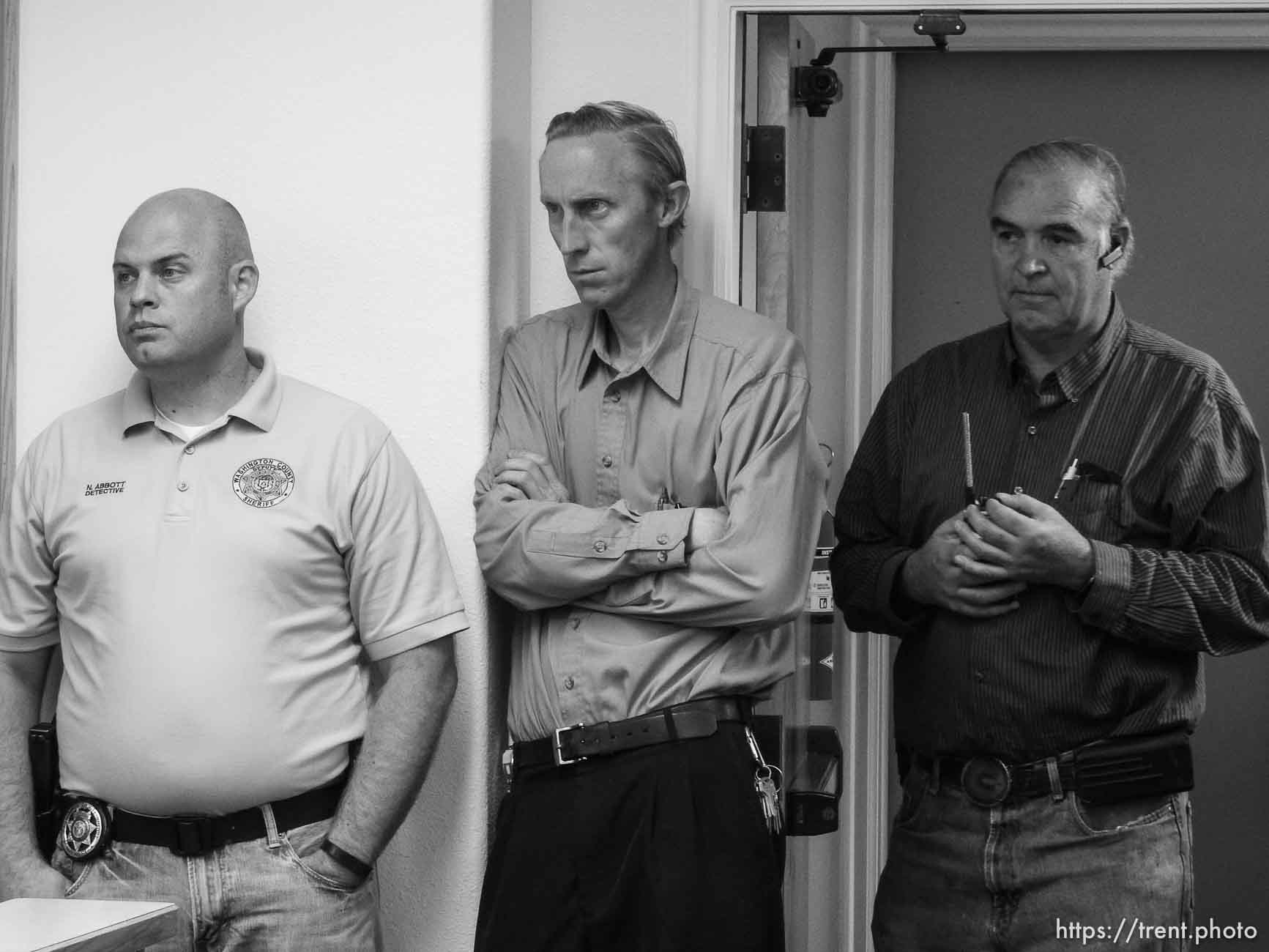 Trent Nelson  |  The Salt Lake Tribune
Flash flood press conference at Colorado City Hall, Tuesday September 15, 2015.
Eight people had died and five remained missing Tuesday morning, the day after an SUV and a van were washed off a road during a flash flood in this polygamous Utah-Arizona border community. joseph allred, center