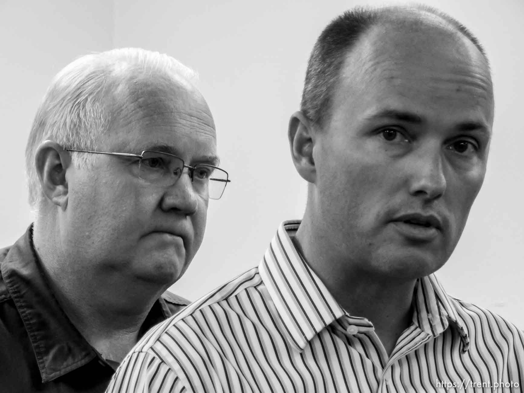 Trent Nelson  |  The Salt Lake Tribune
Utah Lt. Governor Spencer Cox, right, speaks with Hildale Mayor Philip Barlow at left, after nine people were killed and five remained missing Tuesday morning, the day after an SUV and a van were washed off a road during a flash flood in this polygamous Utah-Arizona border community.