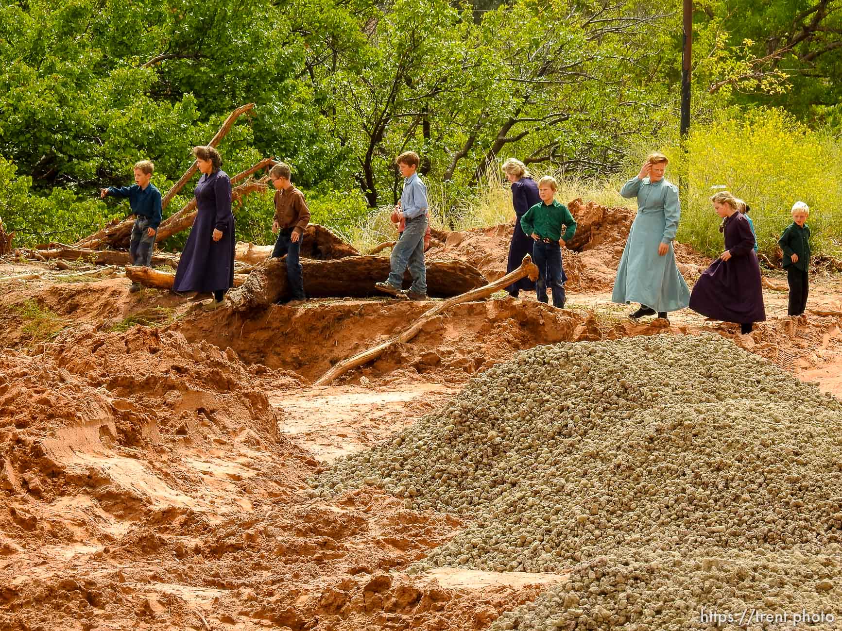 Trent Nelson  |  The Salt Lake Tribune
People take in the scene in a Hildale wash where a flash flood killed nine people (with four still missing) Tuesday September 15, 2015., the day after an SUV and a van were washed off a road during a flash flood in this polygamous Utah-Arizona border community.