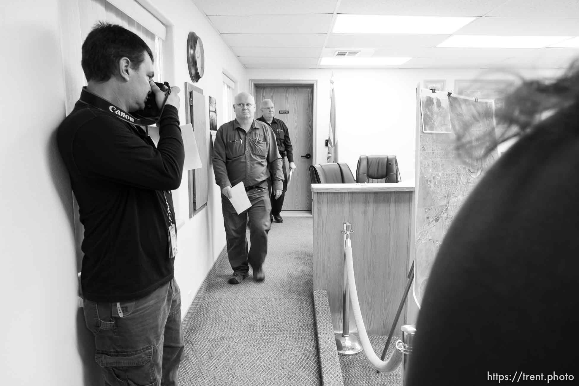 Trent Nelson  |  The Salt Lake Tribune
Hildale Mayor Phillip Barlow speaks at a press conference regarding the continued search after a flash flood. Colorado City, Wednesday September 16, 2015. city manager raymond barlow in front. scott winterton at left