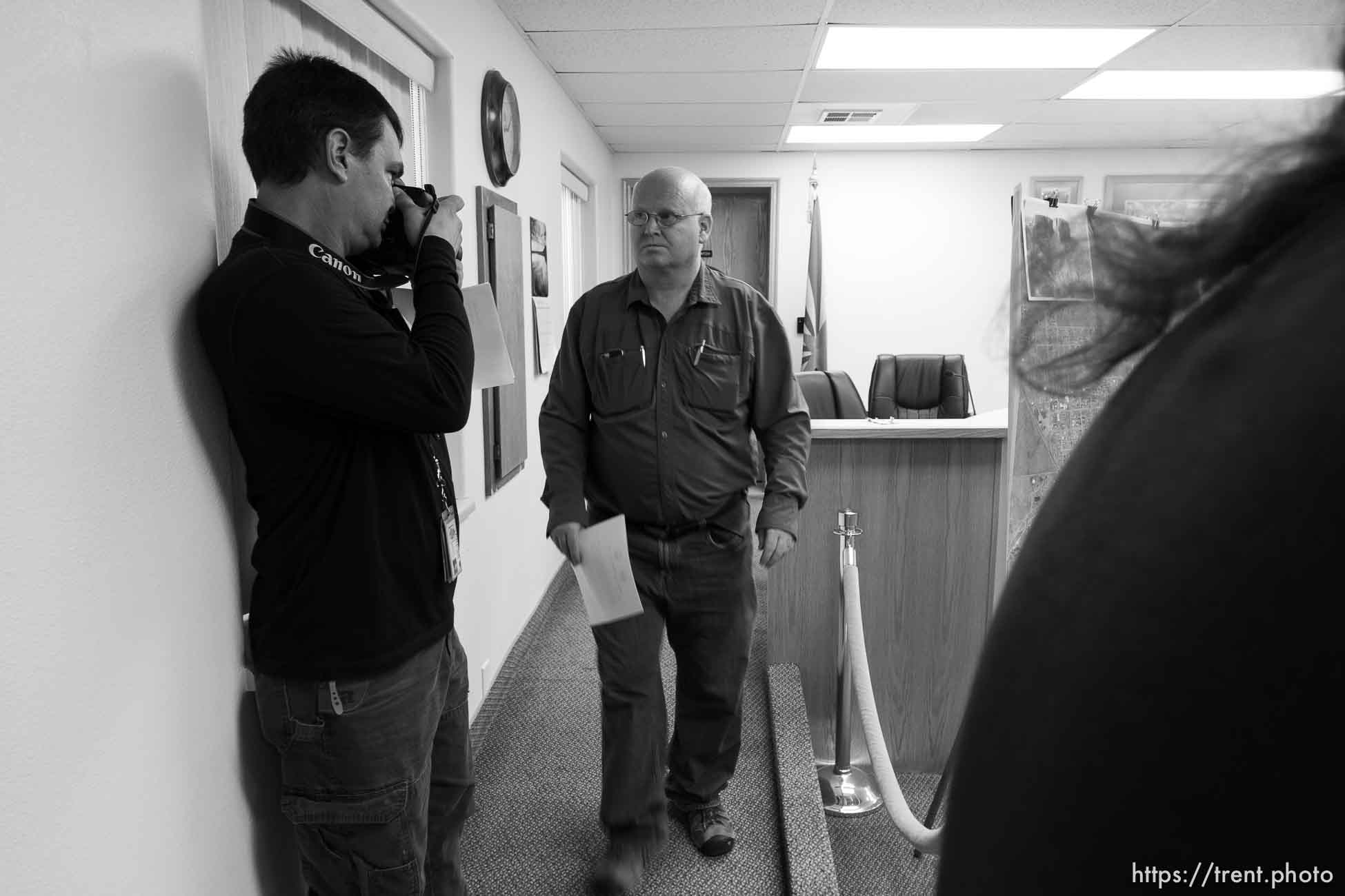 Trent Nelson  |  The Salt Lake Tribune
Hildale Mayor Phillip Barlow speaks at a press conference regarding the continued search after a flash flood. Colorado City, Wednesday September 16, 2015. city manager raymond barlow in front. scott winterton at left