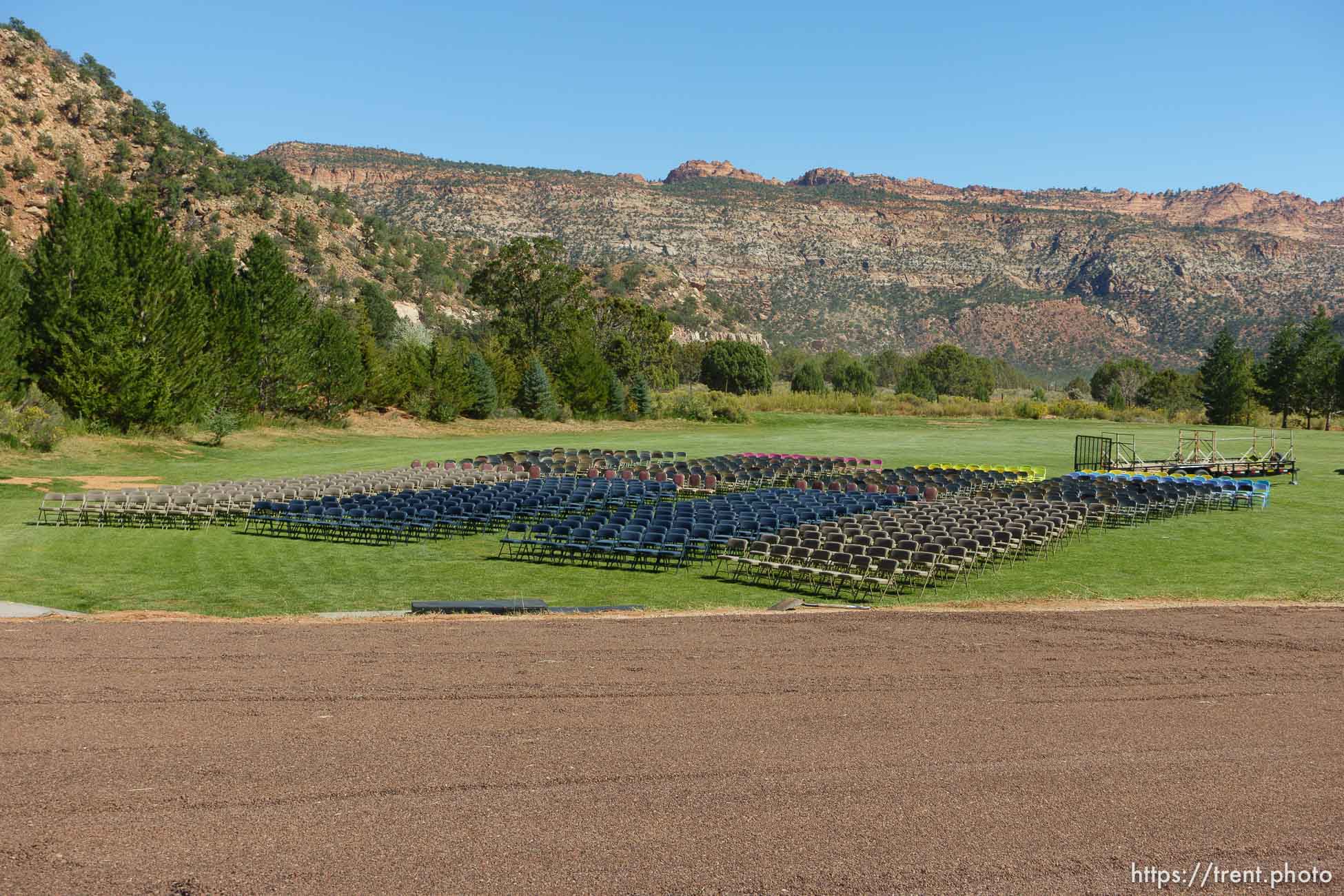 Trent Nelson  |  The Salt Lake Tribune
chairs set out for a memorial for the 13 (and 1 still missing) victims of a September 14th flash flood. The memorial was held in Maxwell Park in Hildale, Friday September 25, 2015.