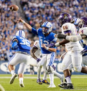 Trent Nelson  |  The Salt Lake Tribune
Brigham Young Cougars quarterback Tanner Mangum (12) passes to Brigham Young Cougars wide receiver Terenn Houk (11) for a first half touchdown as BYU hosts East Carolina, college football at LaVell Edwards Stadium in Provo, Saturday October 10, 2015.