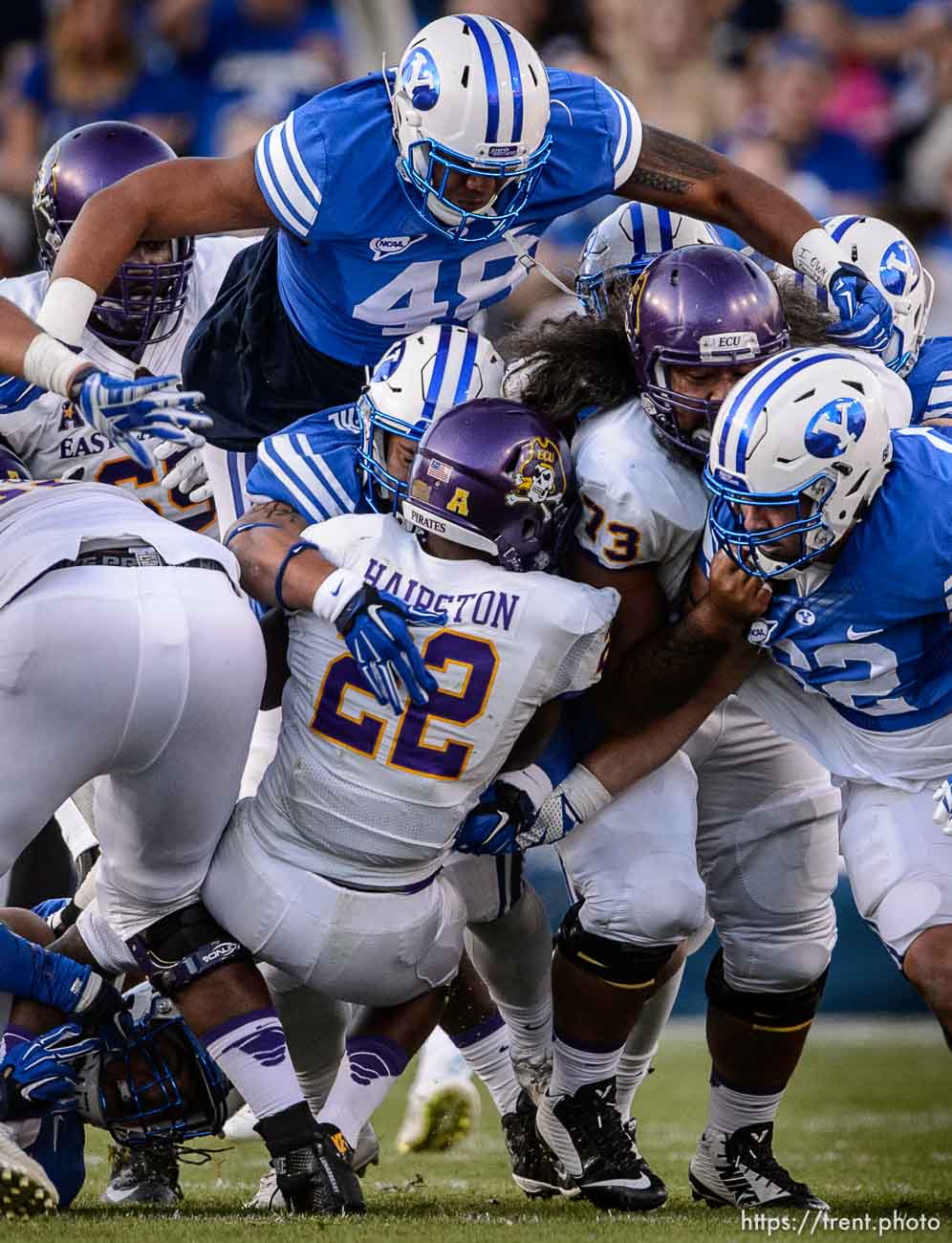 Trent Nelson  |  The Salt Lake Tribune
Brigham Young Cougars defensive lineman Tomasi Laulile (48) comes over the top on a third down stop as BYU hosts East Carolina, college football at LaVell Edwards Stadium in Provo, Saturday October 10, 2015.