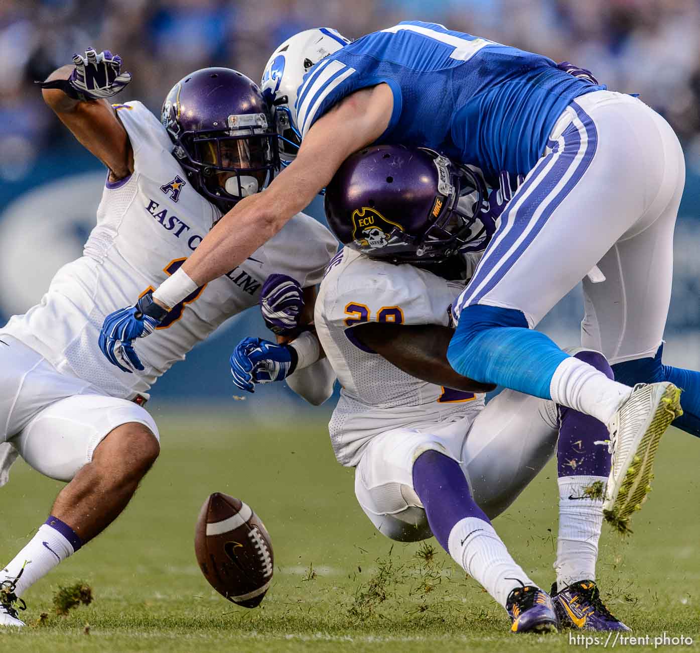 Trent Nelson  |  The Salt Lake Tribune
Brigham Young Cougars wide receiver Mitch Mathews (10), defended by East Carolina Pirates defensive back Travon Simmons (3) and East Carolina Pirates defensive back Josh Hawkins (28) as BYU hosts East Carolina, college football at LaVell Edwards Stadium in Provo, Saturday October 10, 2015.