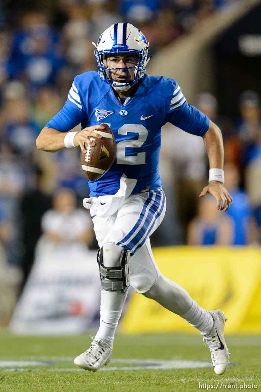 Trent Nelson  |  The Salt Lake Tribune
Brigham Young Cougars quarterback Tanner Mangum (12) scrambles as BYU hosts East Carolina, college football at LaVell Edwards Stadium in Provo, Saturday October 10, 2015.