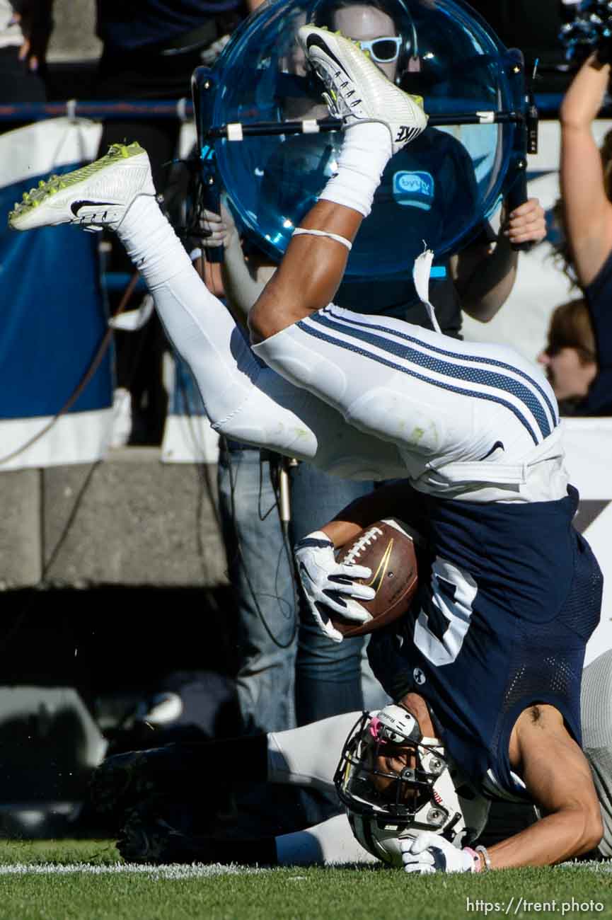 Trent Nelson  |  The Salt Lake Tribune
Wagner Seahawks linebacker Nick Menocal (17) brings down Brigham Young Cougars wide receiver Trey Dye (6) as BYU hosts Wagner, NCAA football at LaVell Edwards Stadium in Provo, Saturday October 24, 2015.