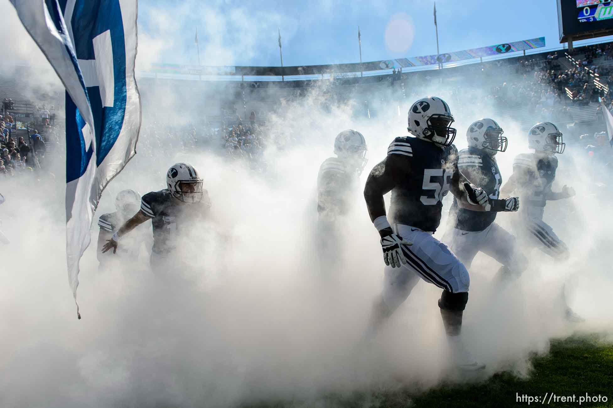 Trent Nelson  |  The Salt Lake Tribune
BYU players storm out of the fog as BYU hosts Wagner, NCAA football at LaVell Edwards Stadium in Provo, Saturday October 24, 2015.