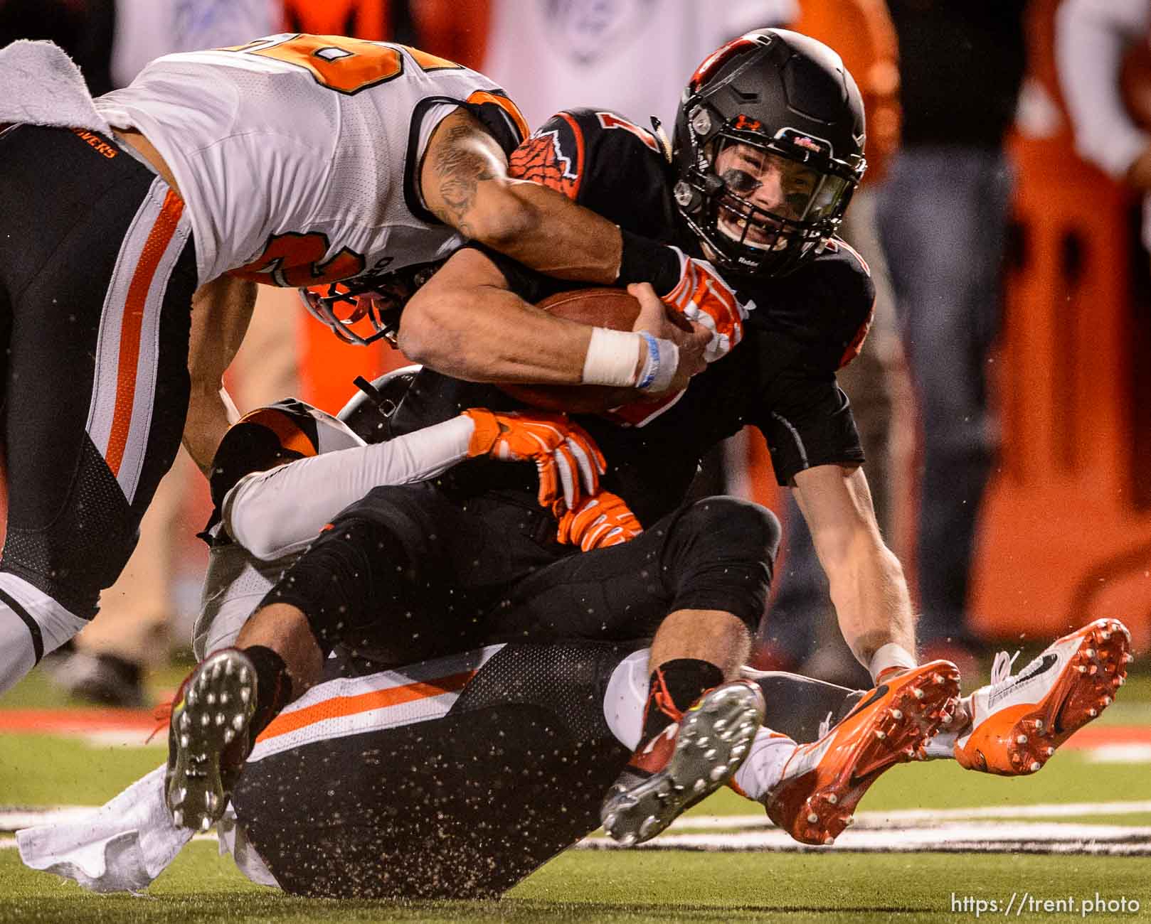 Trent Nelson  |  The Salt Lake Tribune
Utah Utes quarterback Travis Wilson (7) is sacked by Oregon State defenders as the University of Utah hosts Oregon State, NCAA football at Rice-Eccles Stadium in Salt Lake City, Saturday October 31, 2015.