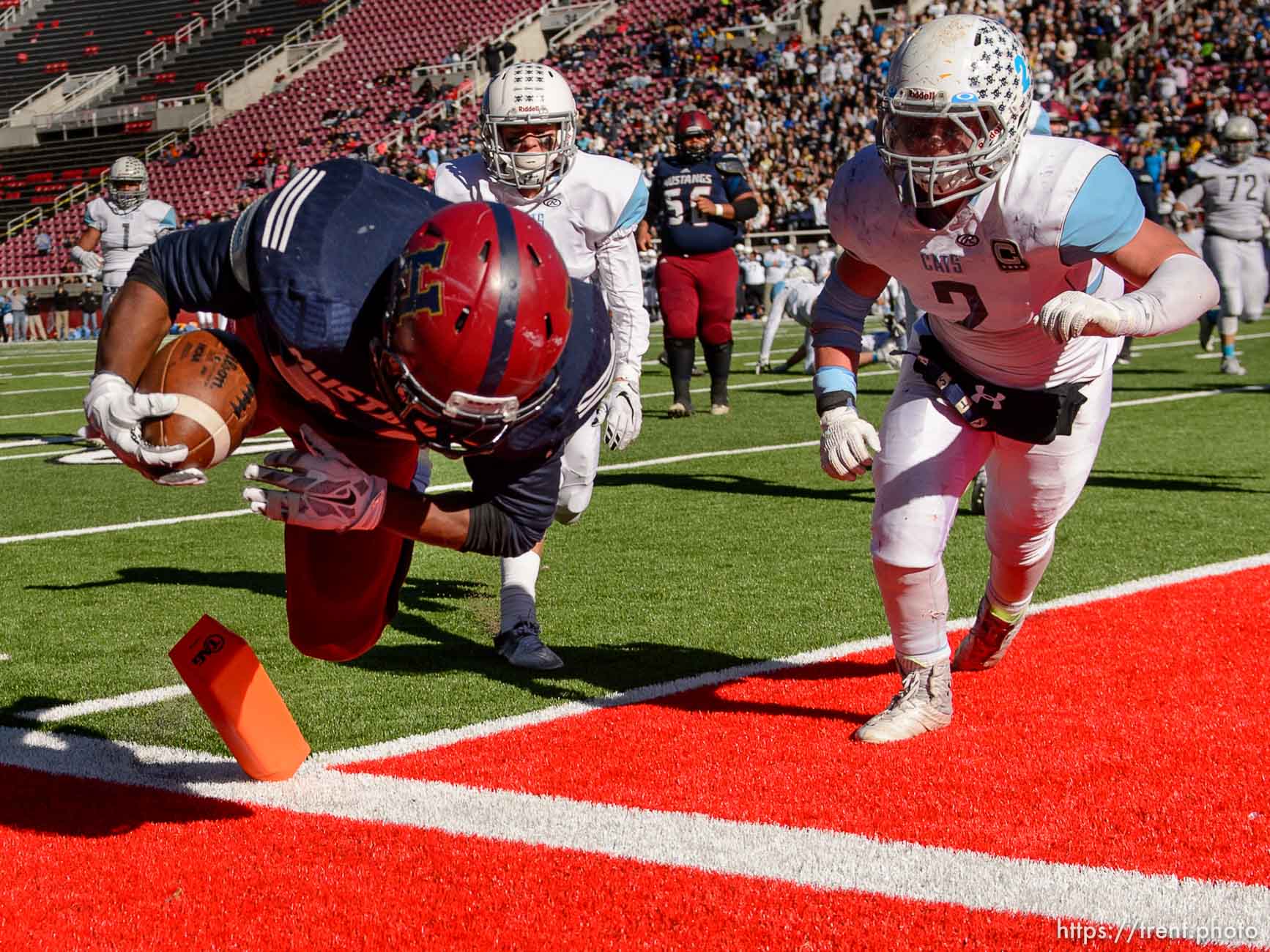 Trent Nelson  |  The Salt Lake Tribune
Herriman's Jake Jutkins (26) dives into the end zone for a touchdown, as Sky View faces Herriman in a 5A high school football semifinal game at Rice-Eccles Stadium in Salt Lake City, Friday November 13, 2015.