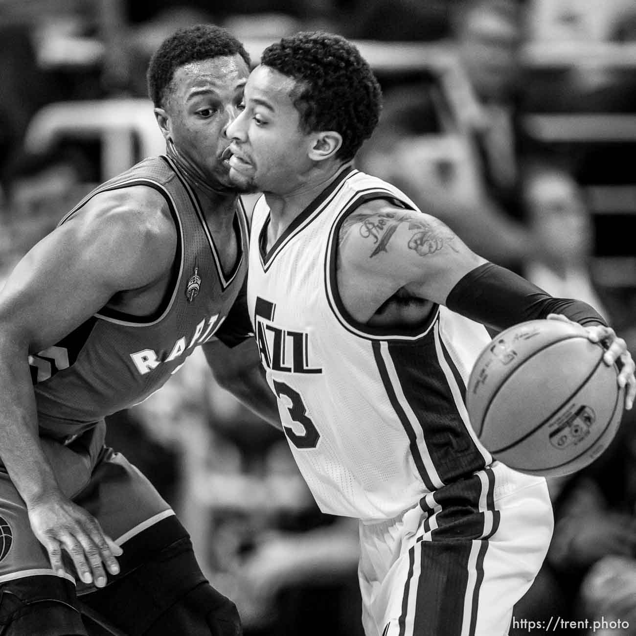 Trent Nelson  |  The Salt Lake Tribune
Utah Jazz guard Trey Burke (3), right, defended by Toronto Raptors guard Kyle Lowry (7), as the Utah Jazz host the Toronto Raptors, NBA basketball at Vivint Smart Home Arena in Salt Lake City, Wednesday November 18, 2015.