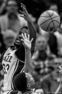 Trent Nelson  |  The Salt Lake Tribune
Utah Jazz forward Trevor Booker (33) reaches for a loose ball as the Utah Jazz host the Toronto Raptors, NBA basketball at Vivint Smart Home Arena in Salt Lake City, Wednesday November 18, 2015.