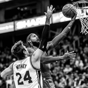 Trent Nelson  |  The Salt Lake Tribune
Toronto Raptors forward James Johnson (3) shoots the ball, with Utah Jazz center Jeff Withey (24) defending, as the Utah Jazz host the Toronto Raptors, NBA basketball at Vivint Smart Home Arena in Salt Lake City, Wednesday November 18, 2015.