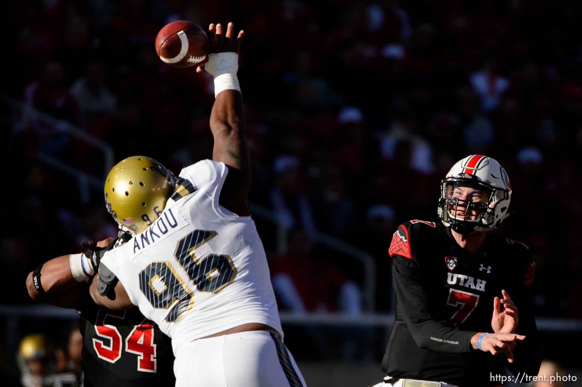 Trent Nelson  |  The Salt Lake Tribune
UCLA Bruins defensive lineman Eli Ankou (96) gets a hand on a pass by Utah Utes quarterback Travis Wilson (7), as the University of Utah hosts UCLA, NCAA football at Rice-Eccles Stadium in Salt Lake City, Saturday November 21, 2015.