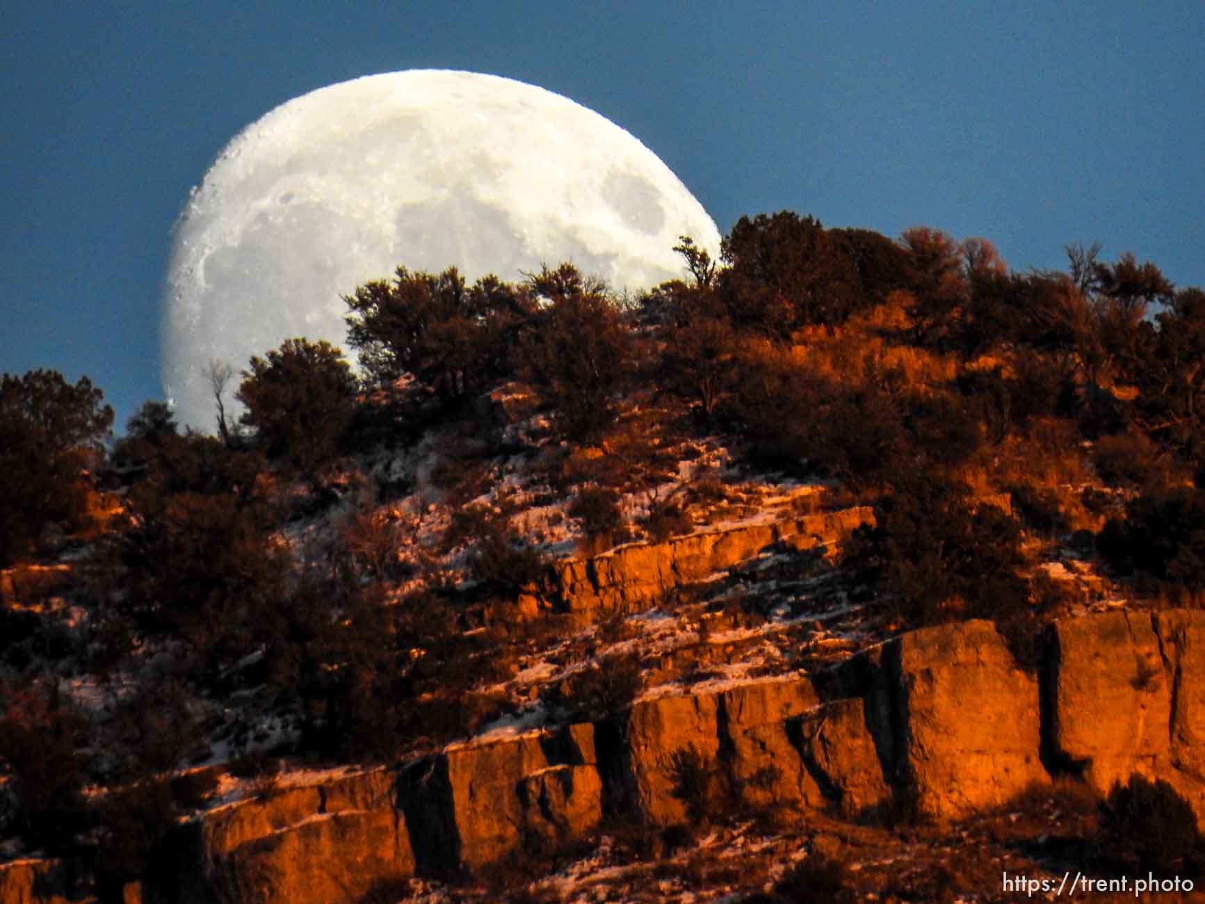 moon at sunset, Sunday November 22, 2015.