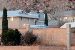 Trent Nelson  |  The Salt Lake Tribune
people watching a fire at the clinic, in Hildale, Wednesday December 2, 2015.