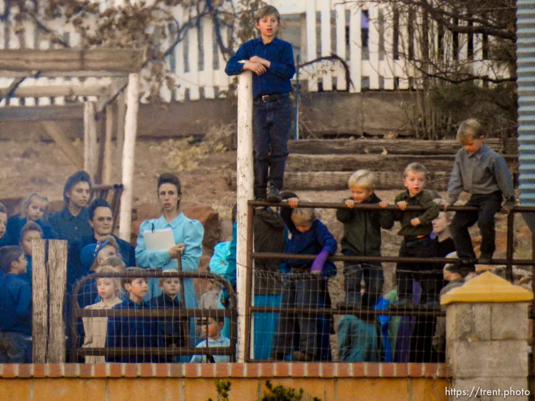 Trent Nelson  |  The Salt Lake Tribune
People look on as a fire burns at the clinic in Hildale, Wednesday December 2, 2015.