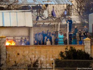 Trent Nelson  |  The Salt Lake Tribune
People look on as a fire burns at the clinic in Hildale, Wednesday December 2, 2015.