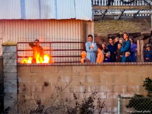 Trent Nelson  |  The Salt Lake Tribune
People look on as a fire burns at the clinic in Hildale, Wednesday December 2, 2015.